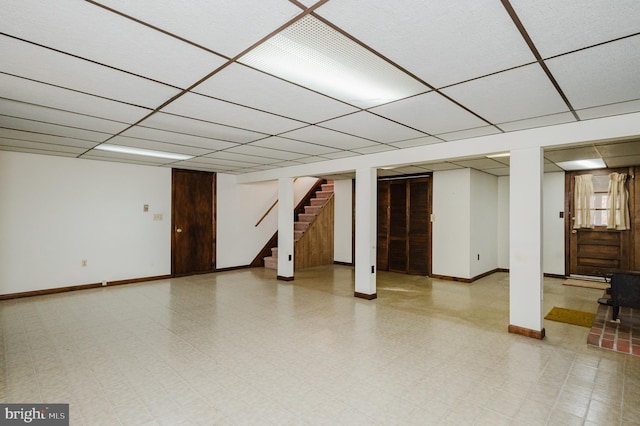 basement with a drop ceiling