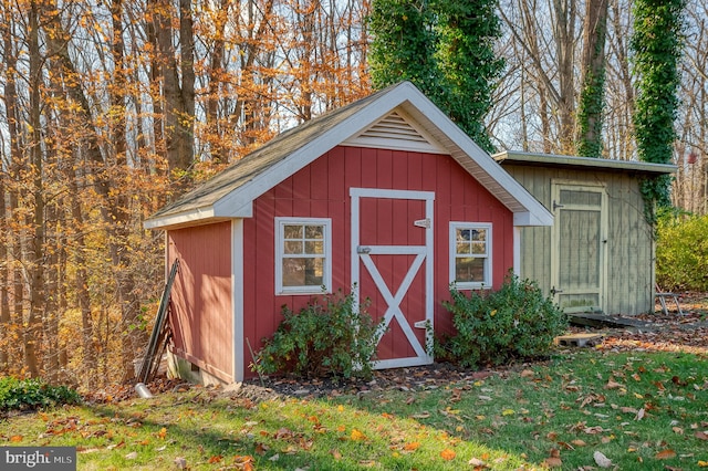 view of outdoor structure with a lawn