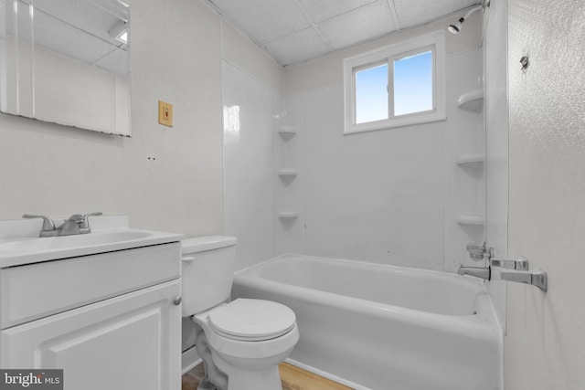 full bathroom featuring hardwood / wood-style flooring, vanity, toilet, and shower / tub combination