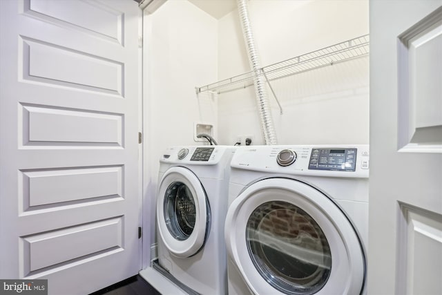 washroom featuring separate washer and dryer