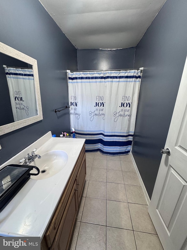 bathroom featuring vanity and tile patterned floors