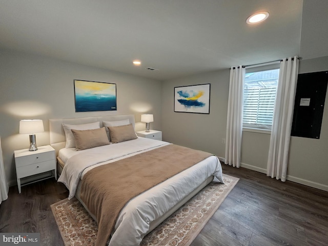 bedroom featuring dark wood-type flooring