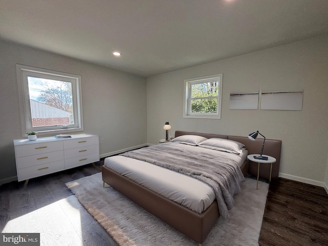 bedroom featuring dark hardwood / wood-style floors