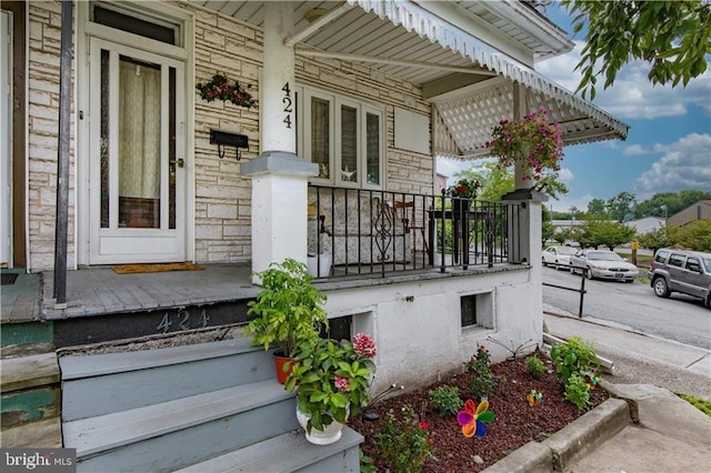 424 E Broad St E, Tamaqua, PA 18252 - doorway to property with stone siding and a porch