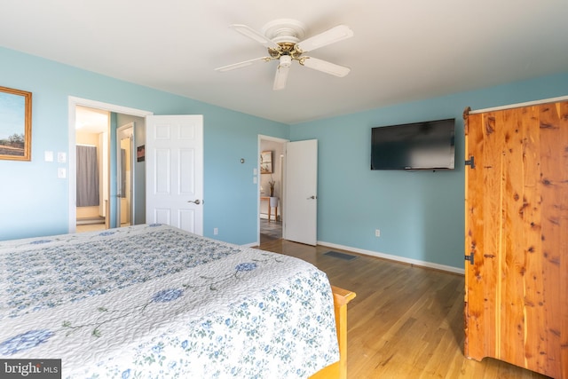 bedroom featuring wood-type flooring and ceiling fan