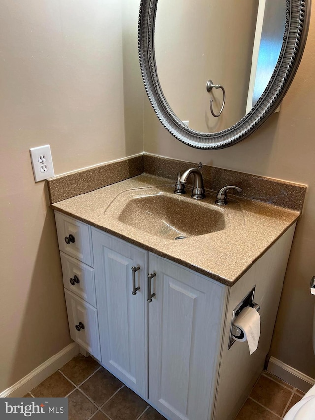 bathroom with vanity and tile patterned floors