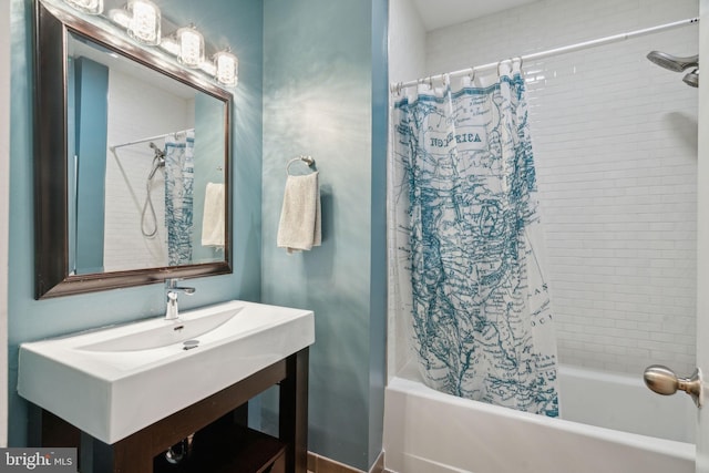 bathroom featuring sink and shower / bath combo