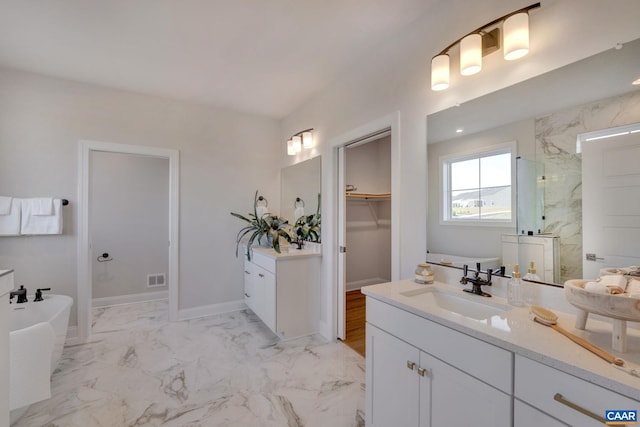 bathroom with vanity and separate shower and tub