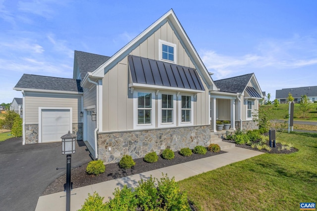 view of front facade with a front lawn and a garage