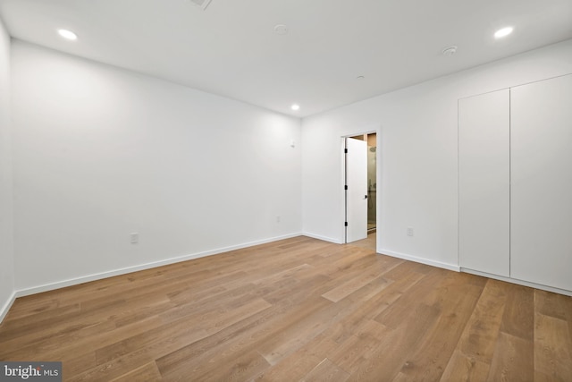 empty room featuring light hardwood / wood-style floors