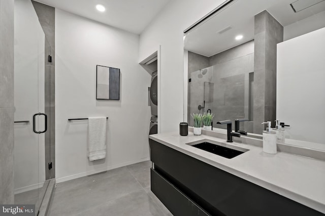 bathroom with vanity, concrete flooring, and walk in shower