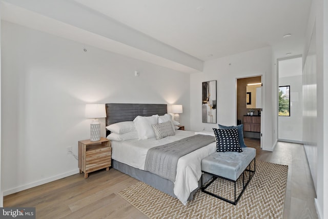 bedroom with light hardwood / wood-style floors