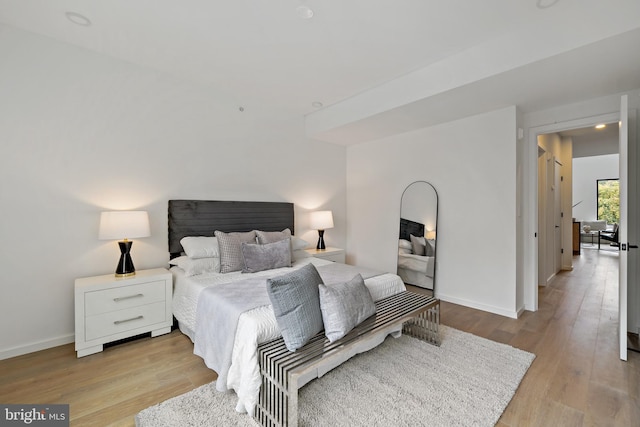 bedroom featuring light hardwood / wood-style floors