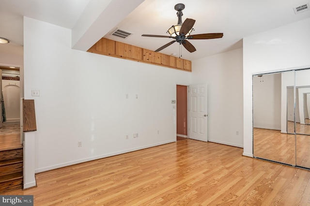 unfurnished bedroom featuring ceiling fan and light hardwood / wood-style flooring