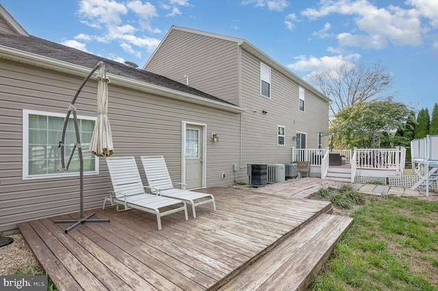 wooden deck with central AC unit