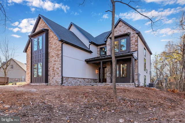 view of front of home featuring cooling unit