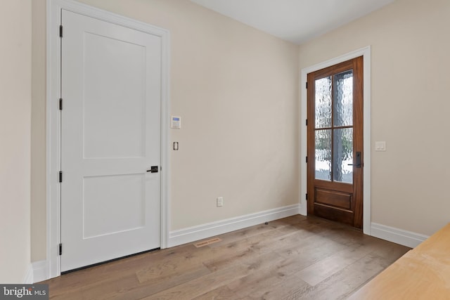 foyer featuring light hardwood / wood-style flooring