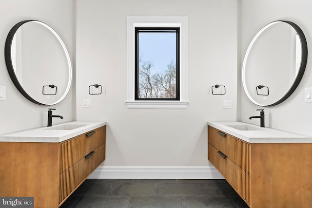 bathroom featuring vanity and tile patterned flooring