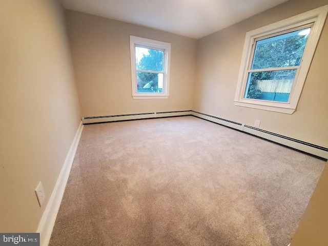 spare room featuring carpet flooring