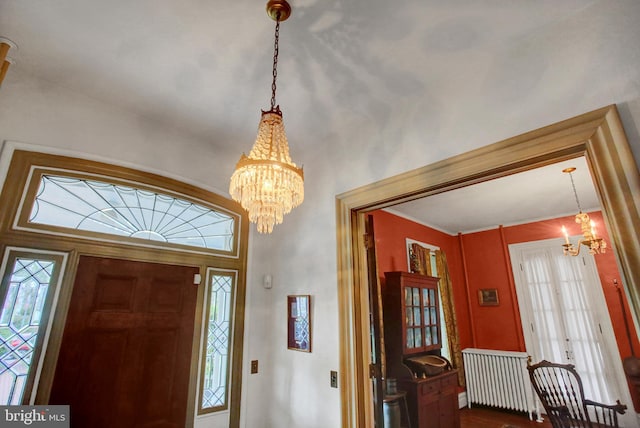 144 W Main St, Waynesboro, PA 17268 - foyer with a chandelier and radiator