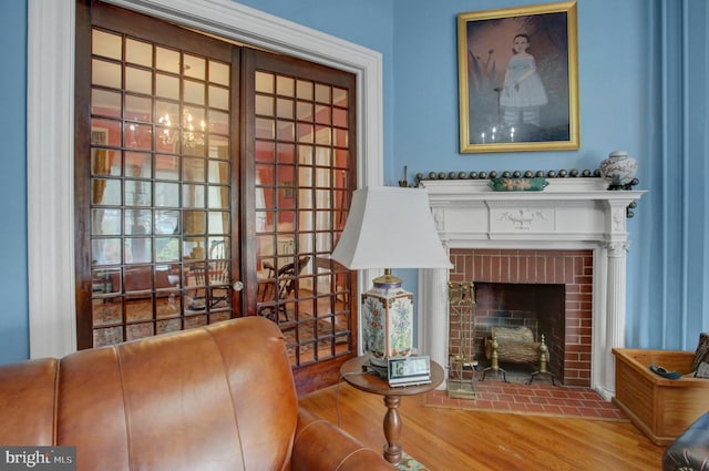 144 W Main St, Waynesboro, PA 17268 - sitting room featuring wood finished floors and a fireplace