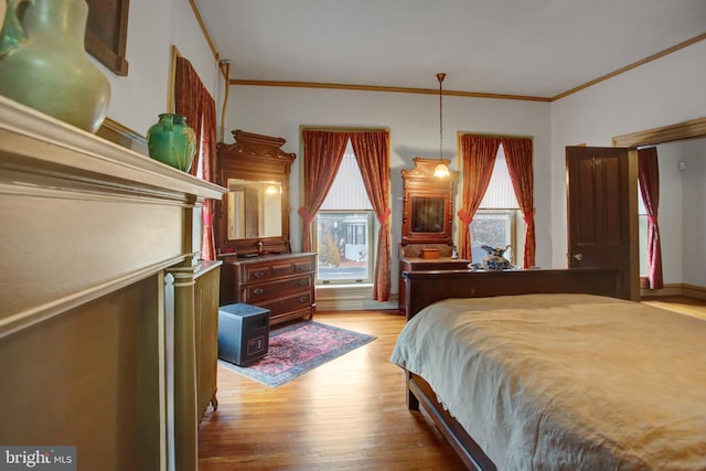 144 W Main St, Waynesboro, PA 17268 - bedroom featuring crown molding and wood finished floors