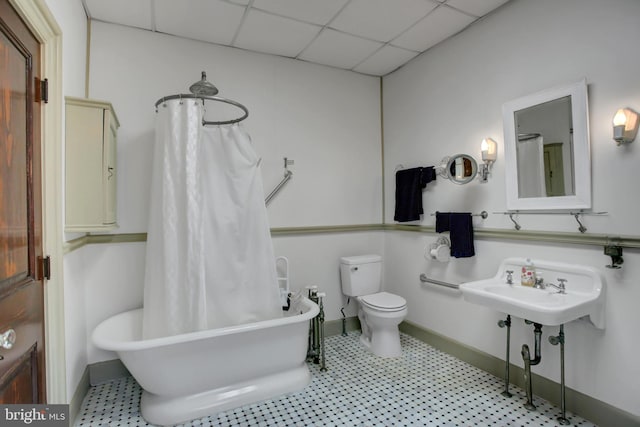 144 W Main St, Waynesboro, PA 17268 - bathroom featuring toilet, baseboards, and a drop ceiling