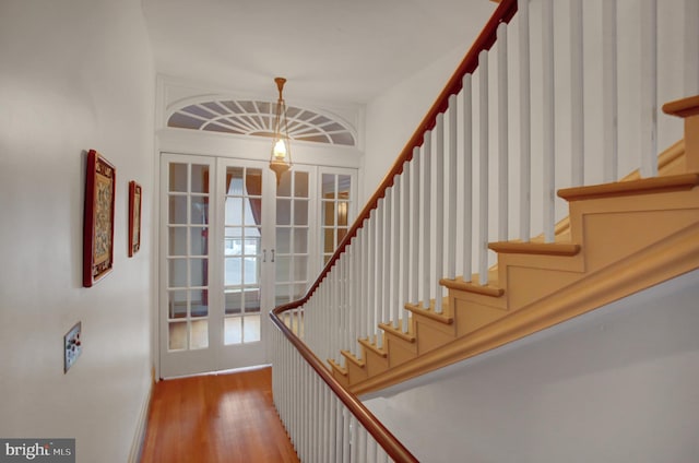 144 W Main St, Waynesboro, PA 17268 - stairway with wood finished floors and french doors
