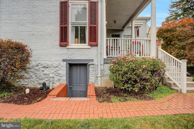 144 W Main St, Waynesboro, PA 17268 - view of exterior entry featuring brick siding