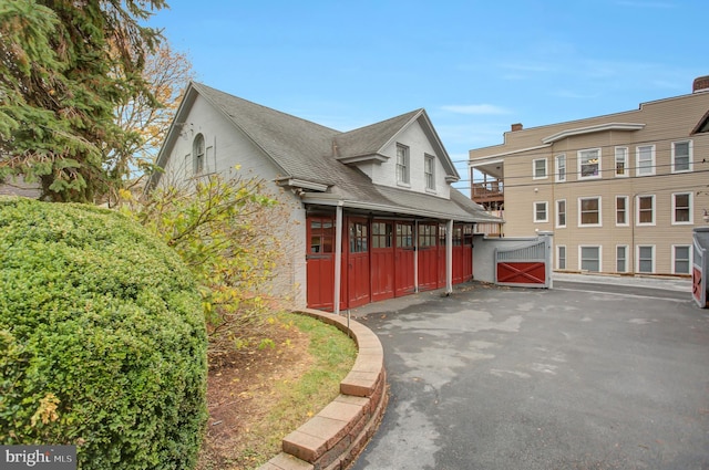 144 W Main St, Waynesboro, PA 17268 - view of side of home with roof with shingles