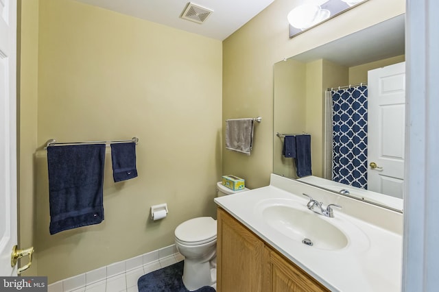 bathroom featuring tile patterned floors, vanity, toilet, and a shower with curtain