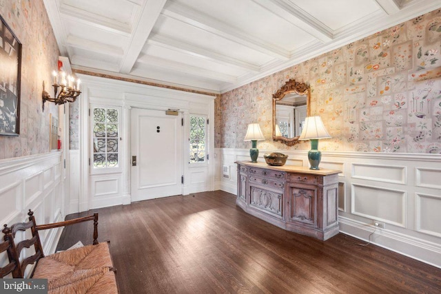 foyer featuring beam ceiling, ornamental molding, dark wood-type flooring, and coffered ceiling