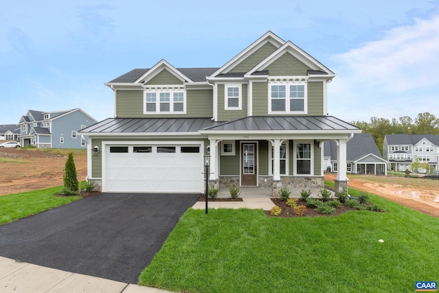 craftsman-style house with a front lawn, a garage, and a porch