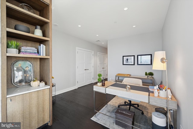 home office featuring dark hardwood / wood-style flooring