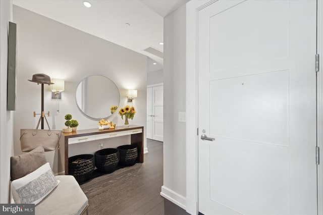 corridor featuring dark hardwood / wood-style floors