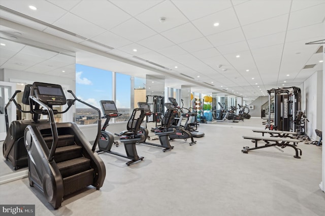 workout area featuring a drop ceiling