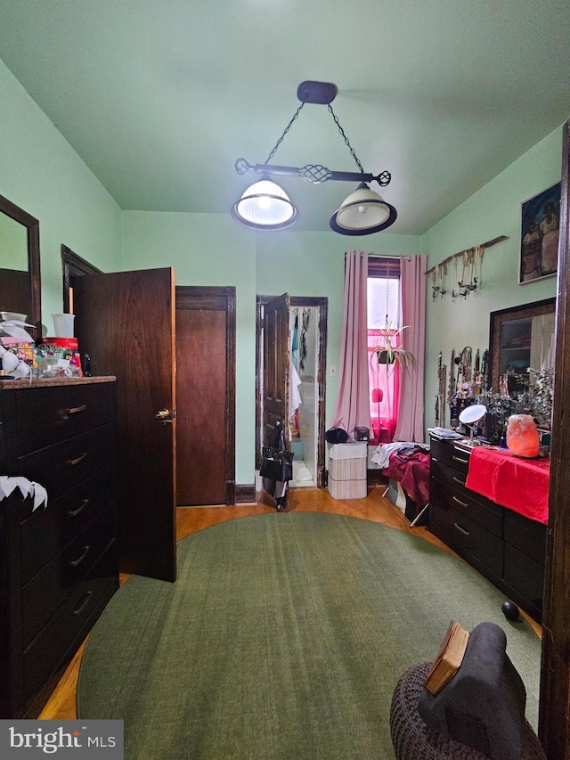 bedroom with light hardwood / wood-style flooring