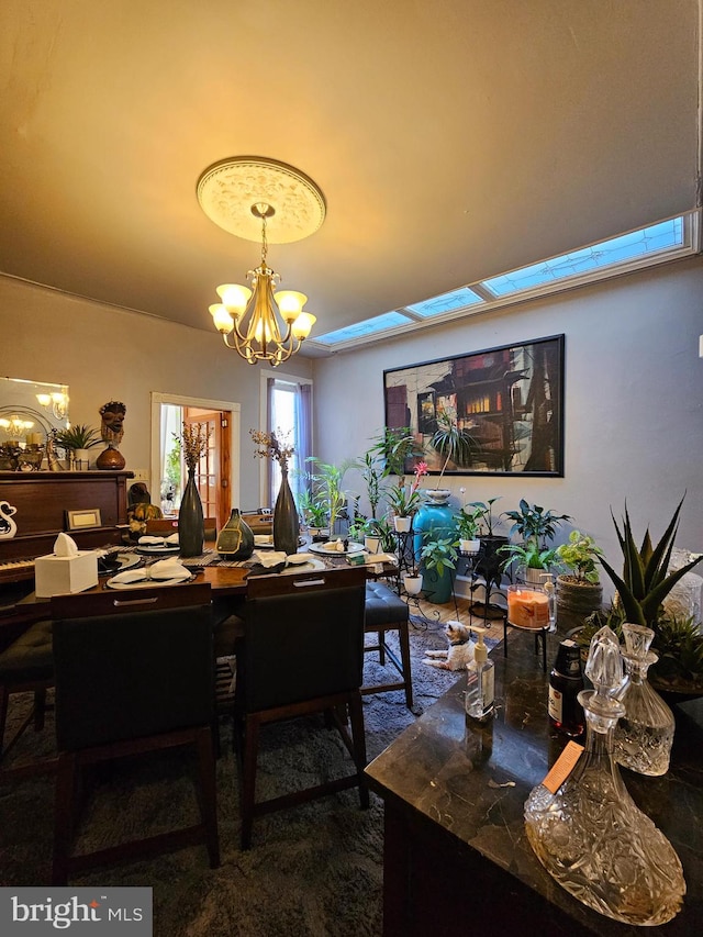 dining area with a chandelier