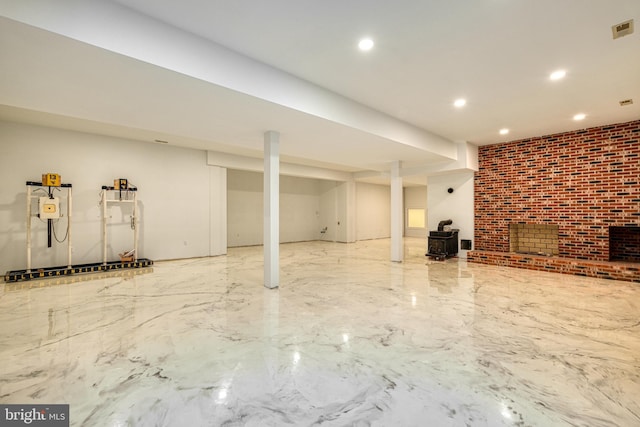 basement featuring a wood stove