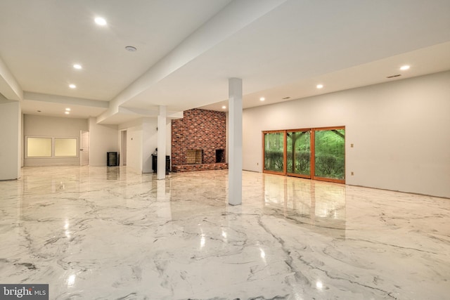 interior space with a brick fireplace