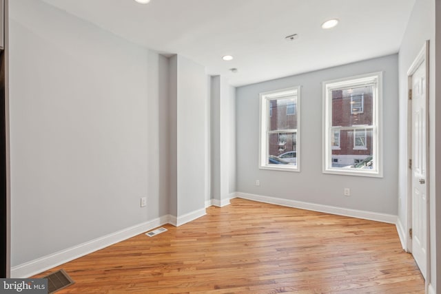 empty room with light wood-type flooring