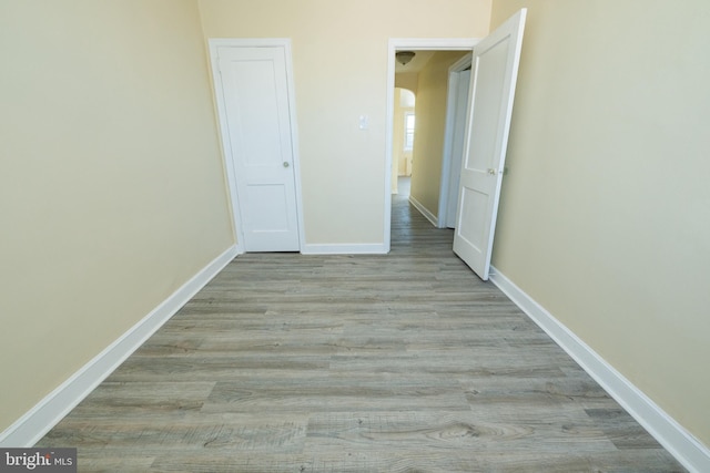 corridor featuring light wood-type flooring