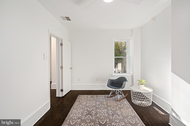 living area with dark wood-type flooring