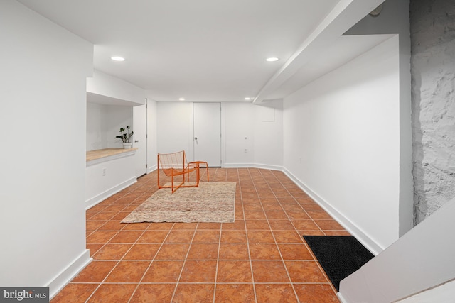 sitting room with tile patterned floors