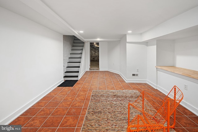 basement with tile patterned flooring