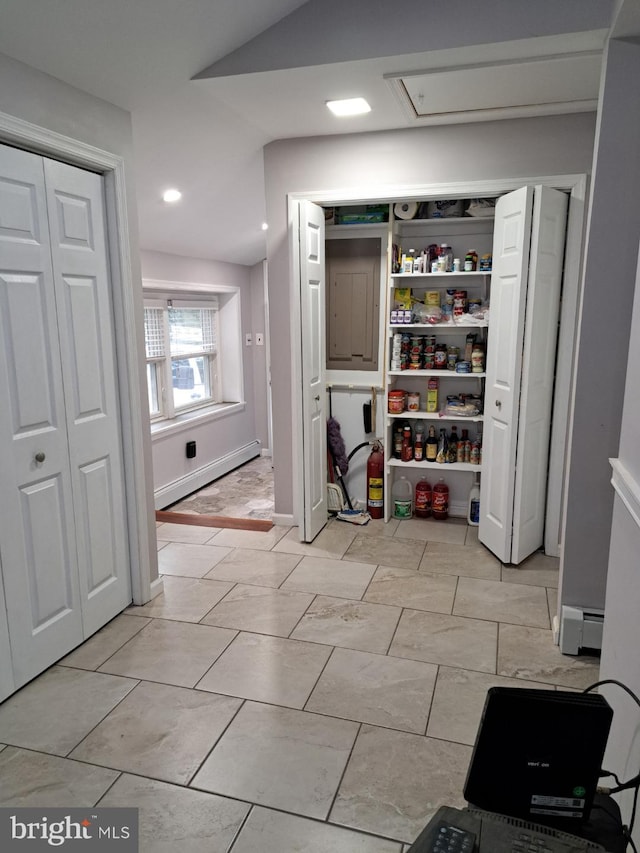 pantry with a baseboard radiator