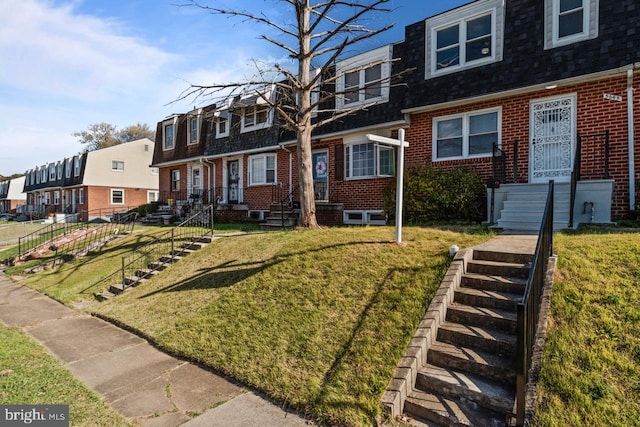 view of front of property with a front yard