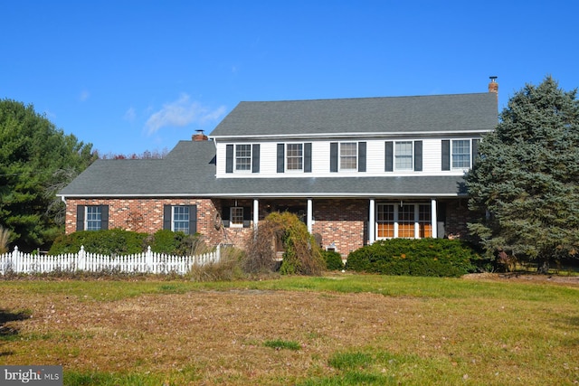 view of front of home with a front yard