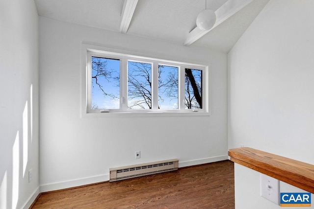 empty room with a baseboard heating unit, dark hardwood / wood-style floors, and beam ceiling