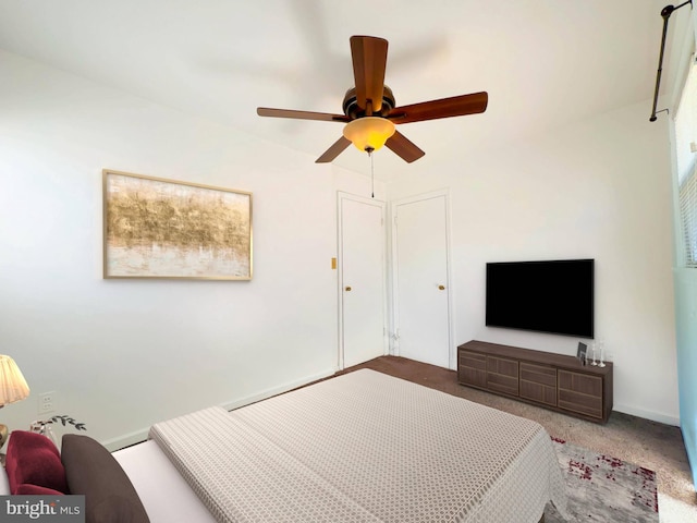 carpeted bedroom featuring ceiling fan